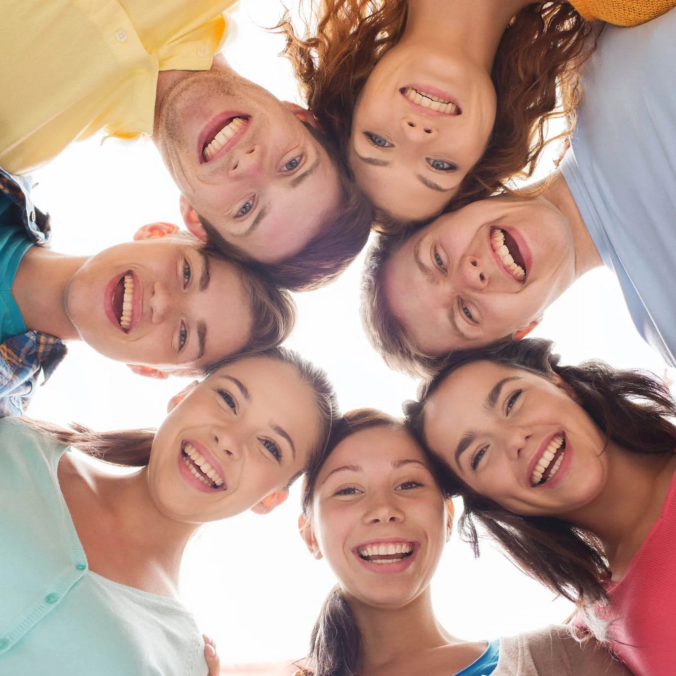 Smiling teens with confident, healthy smiles at Suffolk Braces in Suffolk, VA